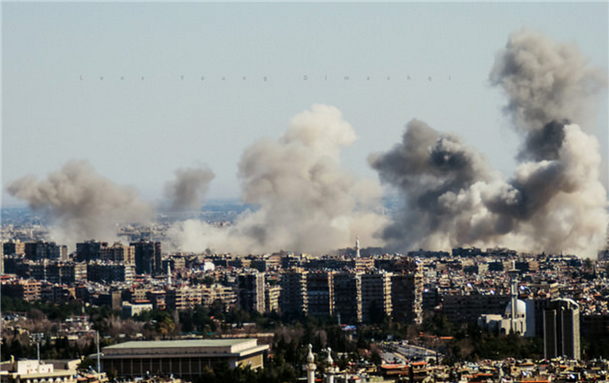 [Image of the hysterical bombing on Ghouta by Syrian Regime and Russian air forces one day before the ceasefire. Image by Dimashqi Lens via Flickr]