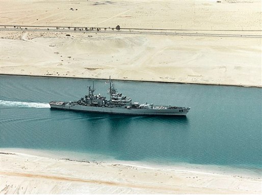 [A USS navy missile cruiser in the Suez Canal, 1992. Image from Wikimedia Commons]