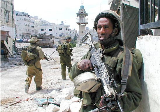 [Israel Defense Forces - Standing Guard in Nablus. Photo taken by IDF and uploaded from Wikimedia Commons]