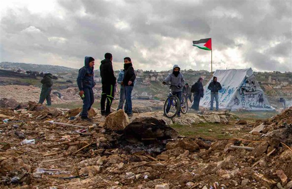 Local Palestinian farmers from Abu Dis and grassroots movements at their protest camp on the outskirts of Jerusalem in February 2015. Image by Juliane Kravik via Flickr