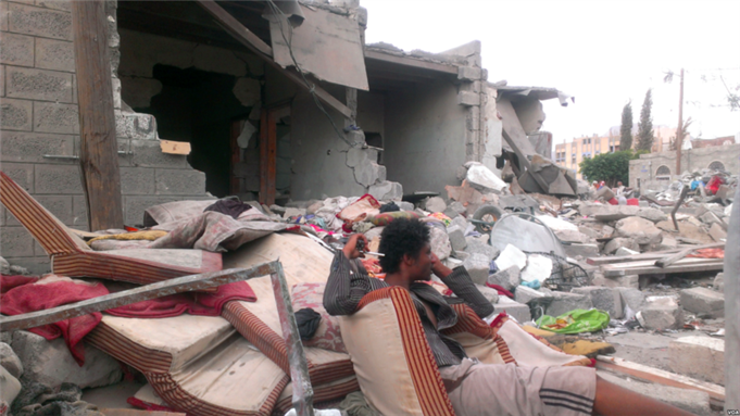 [On the day after a July airstrike in Sana`a, Yemen, families mourn their lost relatives but say there is no way they have the resources to rebuild their homes, July 13, 2015. Almigdad Mojalli/VOA from Wikimedia Commons]