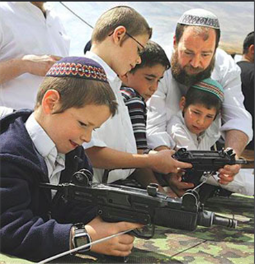 [Israelis settlers teach their children to kill early If you were to believe the bigoted against Mulims MSM only Palestinians teach their children to kill early, this photo proves the teaching of murder at an early age occurs on both sides. Image credit to Bird Eye, uploaded via Flickr]