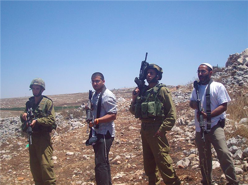 [IDF soldiers and Israeli settlers 7 August 2009. Originally posted to Flickr as settlers and soldiers attacking demonstrators]