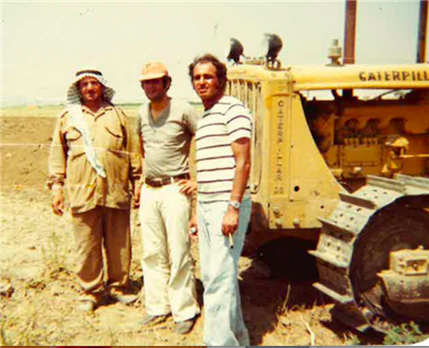 [An Elmusa family’s tractor: taken in al-Karamah camp by Anonymous in October, 1982 in the Jordan Valley|| From left to right: Author’s uncle (father’s brother, Sa`ad), Sharif Elmusa and his brother Ibrahim]