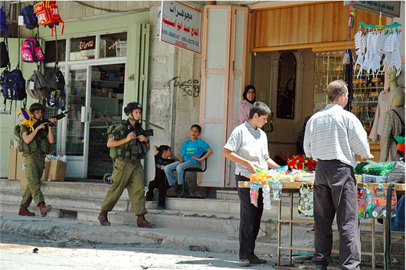 [Israeli soldiers in Hebron. Picture taken by Justin McIntosh and uploaded via Wikimedia Commons]