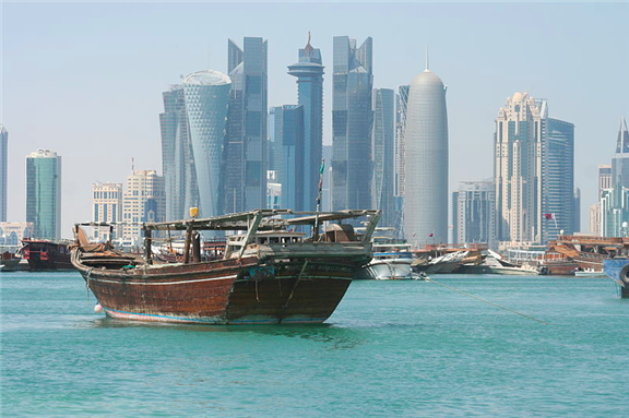 [West Bay Skyline, Doha, Qatar. Photo taken by Gregory Hawken Kramer and uploaded via Wikimedia Commons]
