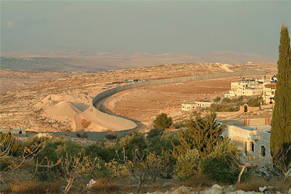 [Separation wall between Israel and Palestine. Photo by Dafna Kaplan and uploaded via Flickr]