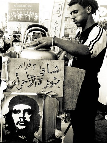 [Tea vendor in Taghyir Square, Sana`a, Yemen, March 2011. Image from Flickr/Sallam. 