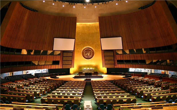 United Nations General Assembly hall in New York City. Photo by Patrick Gruban via Wikimedia Commons.