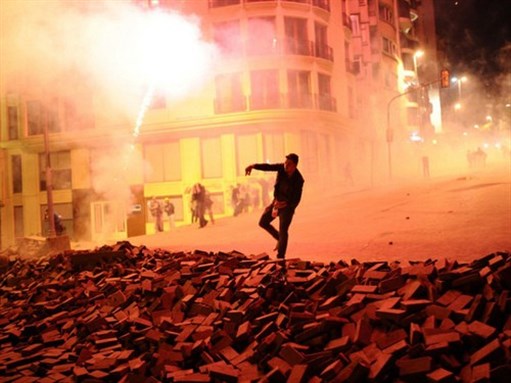 [Protestors clash with Turkish riot policemen on the way to Taksim Square in Istanbul on 5 June 2013. Photo by newsonline via Flickr]
