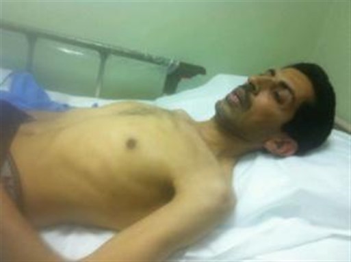 [Abdulhadi al-Khawaja in hospital, April 6. Image from Frontline Defenders]