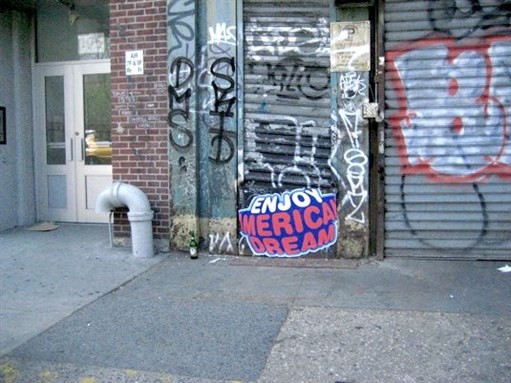 [\"Enjoy American Dream\" sticker in downtown New York City. Image from globalgraphica.com]