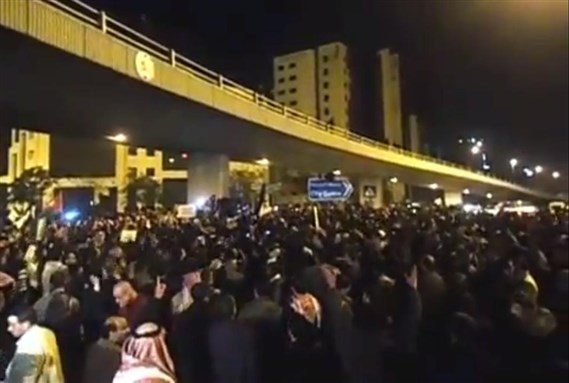 [Protesters gathered at Duwwar al-Dakhiliyyeh in Amman on 13 November 2012. Image from screen shot of YouTube video]