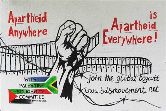 [Poster created by the the Palestine Solidarity Committee of South Africa. Image via Wikimedia Commons.]