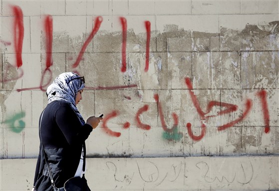 [Graffiti in Cairo calling on Egyptians to protest the Egyptian regime and austerity measures following the nationwide price hikes. Photo from Aswat Masriya.]