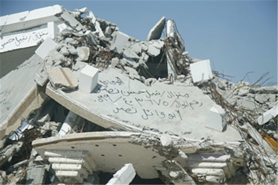 [Destroyed Home in Gaza, 2014. Image by gloucester2gaza via Wikimedia Commons]