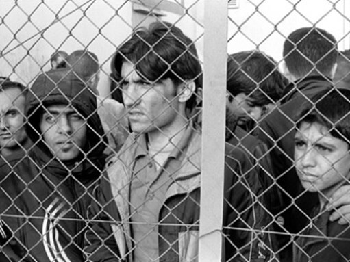 [Refugees in Fylakio Detention Center, Greece. Image by Ggia via Wikimedia Commons]