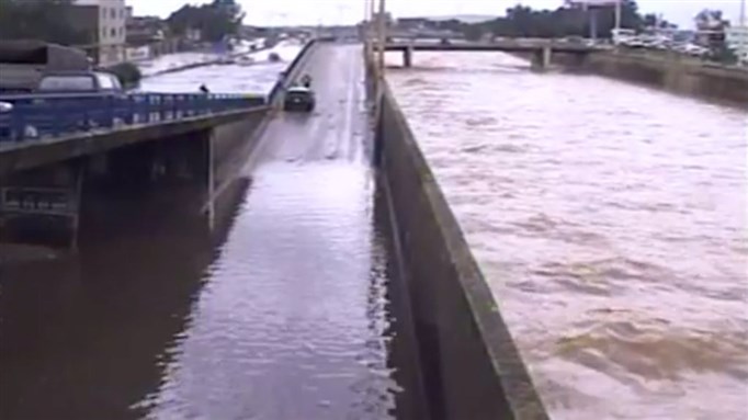 [News footage of a part of Beirut flooding. Image is screenshot from LBC video.]