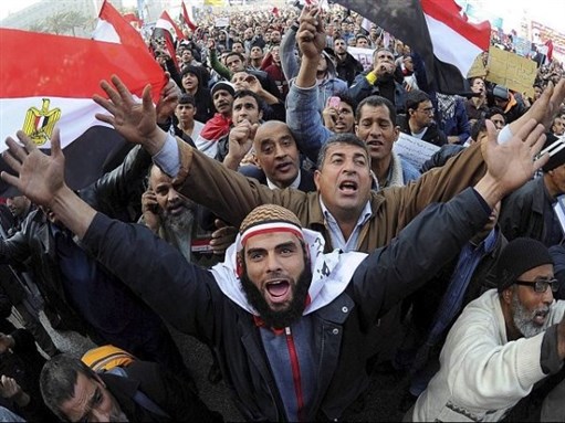 [Egyptian workers protesting in 2011. Image from Google Images] 