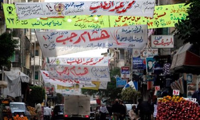 [Campaign banners and signs for Egypt`s first elections after 25 January 2011.]