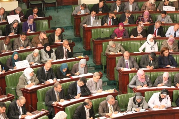 [Ennahda members of the constituent assembly photographed last year. Concerns with Tunisia`s constitution continue to extend to the constitutional process itself. Image from Moumou82/Flickr.] 
