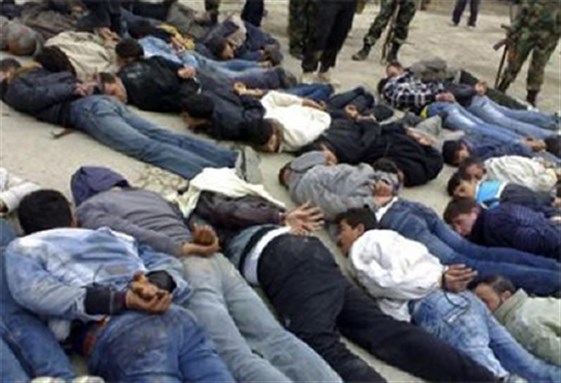 [Handcuffed Syrian protesters on the ground after being arrested following a demonstration in Baida in April. Image from independent.co.uk]