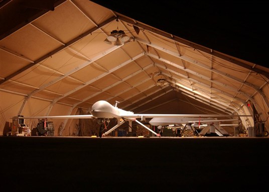 [RQ-1 Predator aircraft at Tallil Air Base, Iraq. Image from Flickr.]