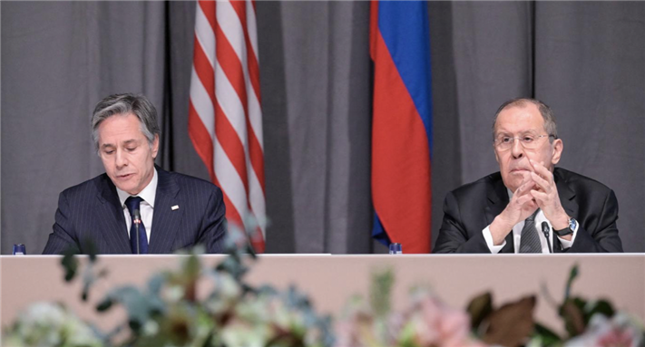 US Secretary of State Antony Blinken (L) and his Russian counterpart Sergei Lavrov speak during a meeting on sidelines of Organisation for Security and Co-operation in Europe meeting in Stockholm, on 2 December (AFP)