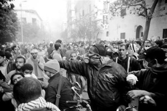 [The front line of the Mohamed Mahmoud Street battles of Nov. 14-19. Image Source: Hossam el-Hamalawy, http://www.flickr.com/photos/elhamalawy/]
