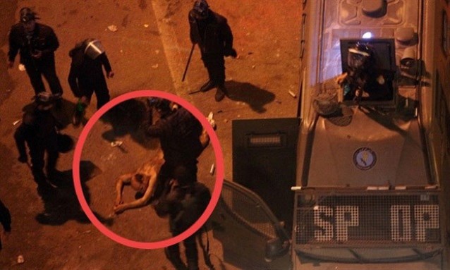 [Hamada Saber beaten up by police forces on 1 February 2013. Photo from ElFagr.org]