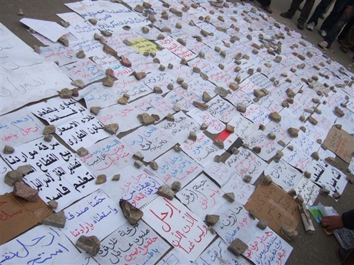 [Signs and Slogans at Tahrir Square. Image by Haytham El-Wardany]