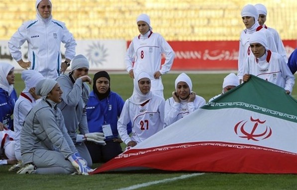 [Iranian women`s national soccer team was disqualified from an Olympic qualifying match against Jordan because of the head covering that players were wearing. Image Source: Reuters]