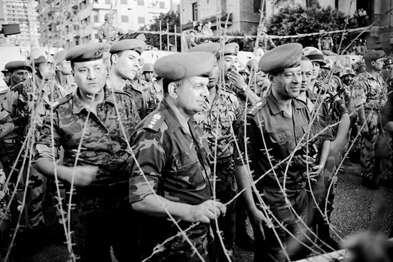 [Military police and the army special forces blocking the anti-SCAF march to SCAF headquarters on 23 July 2011. Photo by Hossam el-Hamalawy]