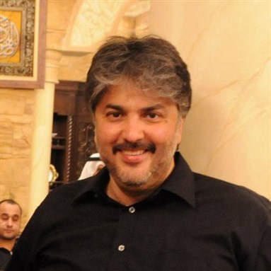 [Founder of Bahrain`s Al-Wasat newspaper, Karim Fakhrawi. Image from unknown archive.]