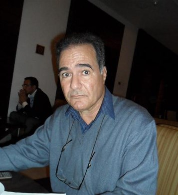 [Omar Al-Kikli. Image from almanoos.com]