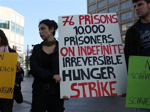 [Protest in support of Kurdish hunger strikers in Berlin. Image by Thomas Rossi Rassloff via Flickr] 