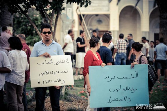 [Cities across Libya continue to protest against extremism and \"jungle law.\" Image from Martyr`s Square Media/Facebook.]