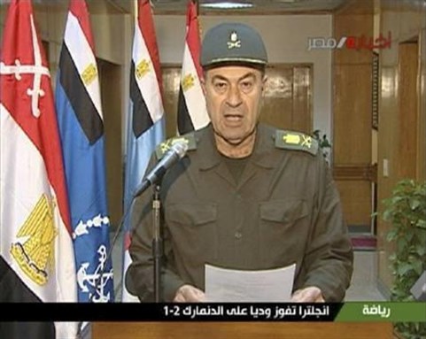 [Egyptian army spokesman speaks on state television. Image Source: Reuters/Egyptian State Television via Reuters TV]