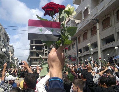 [Peaceful protest in Syria. Image from amnesty.org]