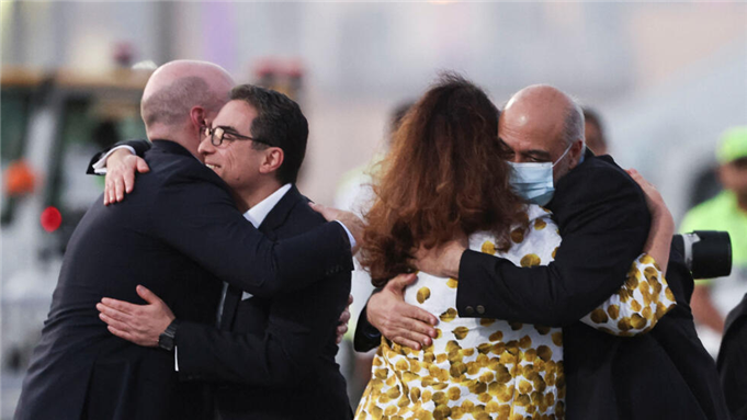 US citizens Siamak Namazi and Morad Tahbaz, who were released during a prisoner swap deal with Iran, arrive at Doha International Airport in Qatar on September 18, 2023. © Mohammed Dabbous, Reuters