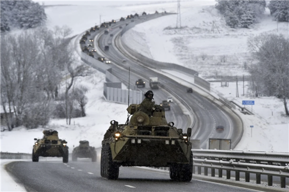 A convoy of Russian armored vehicles moves along a highway in Crimea. File photo: AP