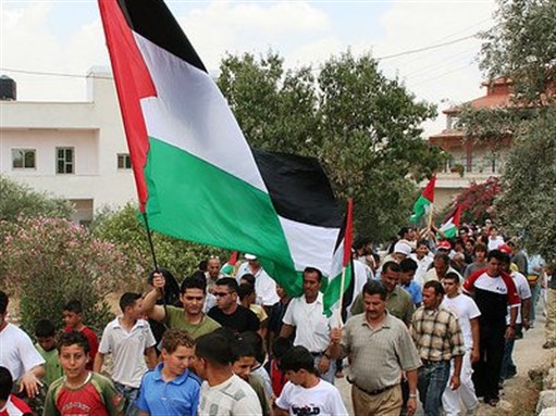 [Protesters in Bil`in village in 2006. Image by Michael Loadenthal via Flickr]