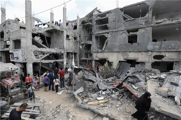 Khaled Nasser’s home (on the right) and his cousin’s home (left) in Beit Hanoun, northern Gaza, two days after it was hit in May 2021. (Mohamed Asad/TNH)