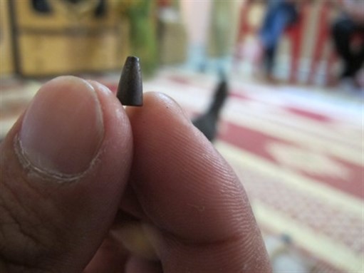 [Bullet that was inside Miled Majthoub. Image from Nour Samaha.]