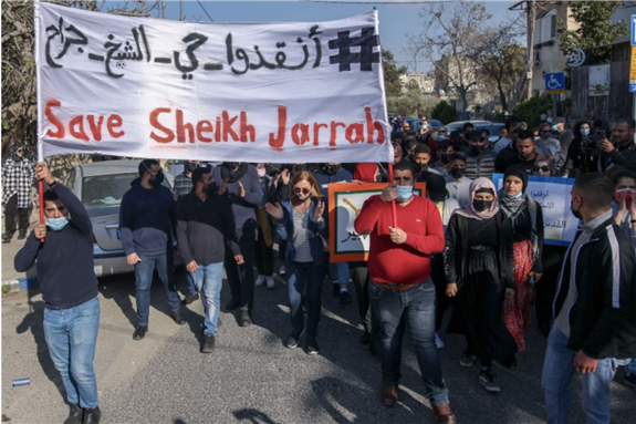 Palestinian, Israeli, and foreign activists demonstrate against Israeli occupation and settlement activity in the Palestinian territories via AFP from Ahmad Gharabli