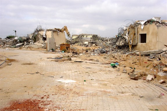 [Destroyed settlement on Aug 31 2005. On 1 Sep 2005 the IDF left Gaza Strip as part of Israel`s unilateral disengagement plan and all Israeli citizens were evicted from the area: Image from www.shutterstock.com]