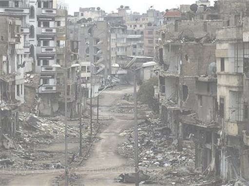 [Damaged street in Homs, Syria, November 2012. Image by Freedom House via Flickr]