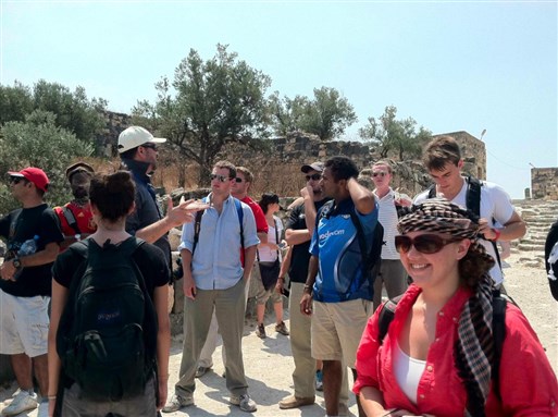 [Students at ancient Roman ruins in Northern Jordan. Image from author.]