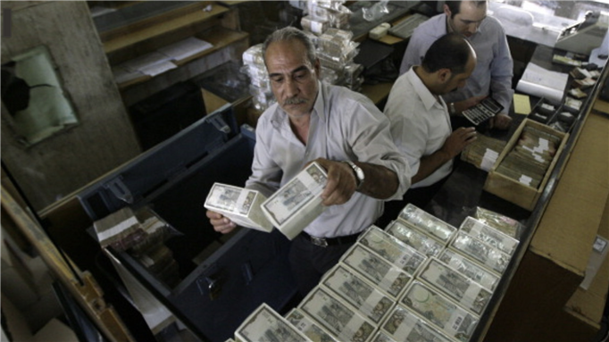 Syria's central bank warned that the country could be soon facing a worsened foreign currency crunch. [Getty]