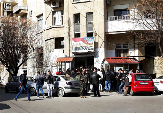 Young men gather in front of the al-Salihiyah Recruitment Branch in the Syrian capital Damascus, 3/2/2019 (Lens Young Dimashqi)